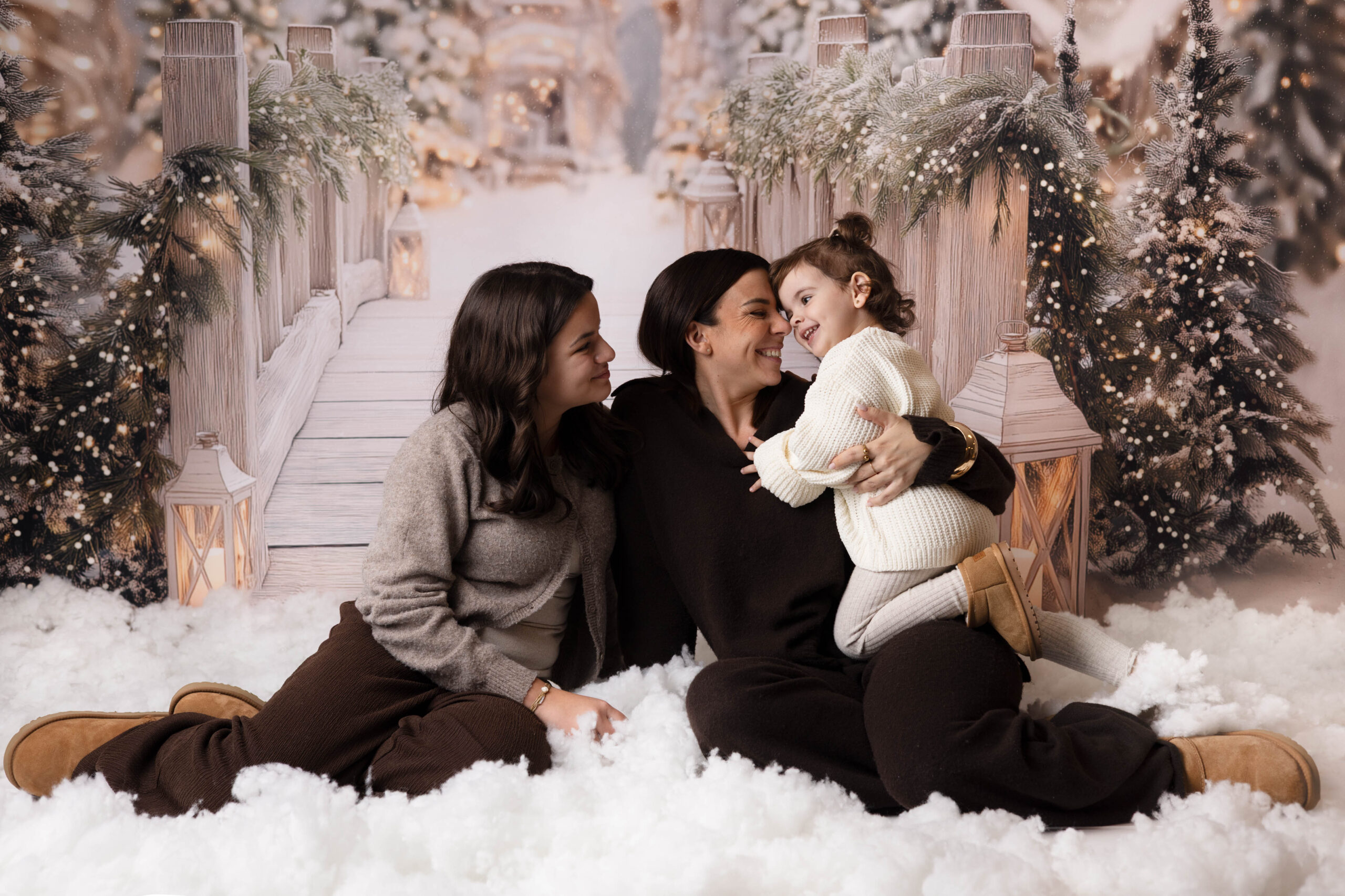 Séance photo de Noël en studio à Lausanne, décor féerique en famille